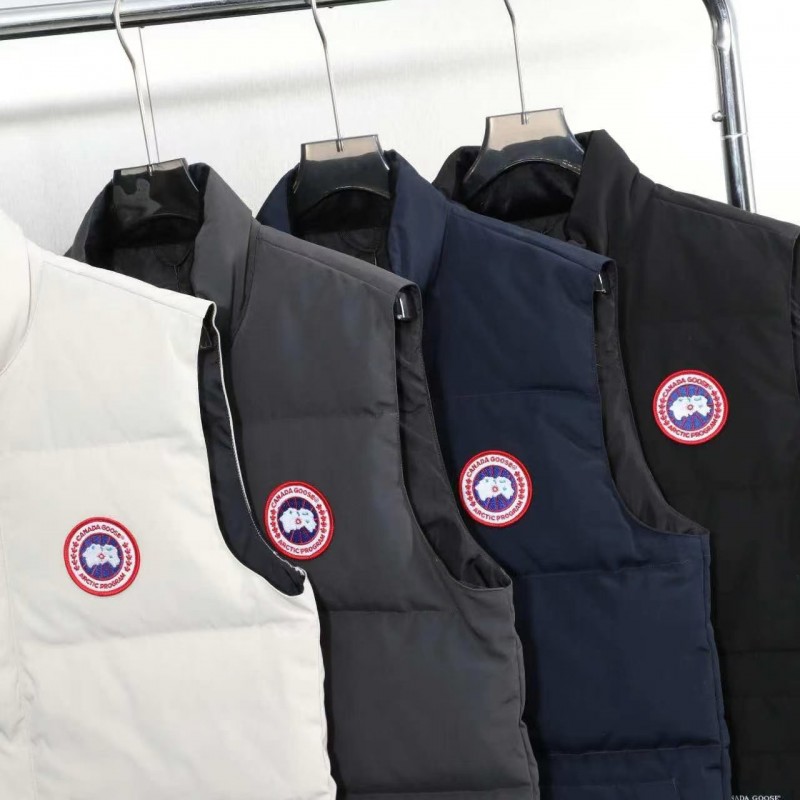 Can*a Go*e down vest