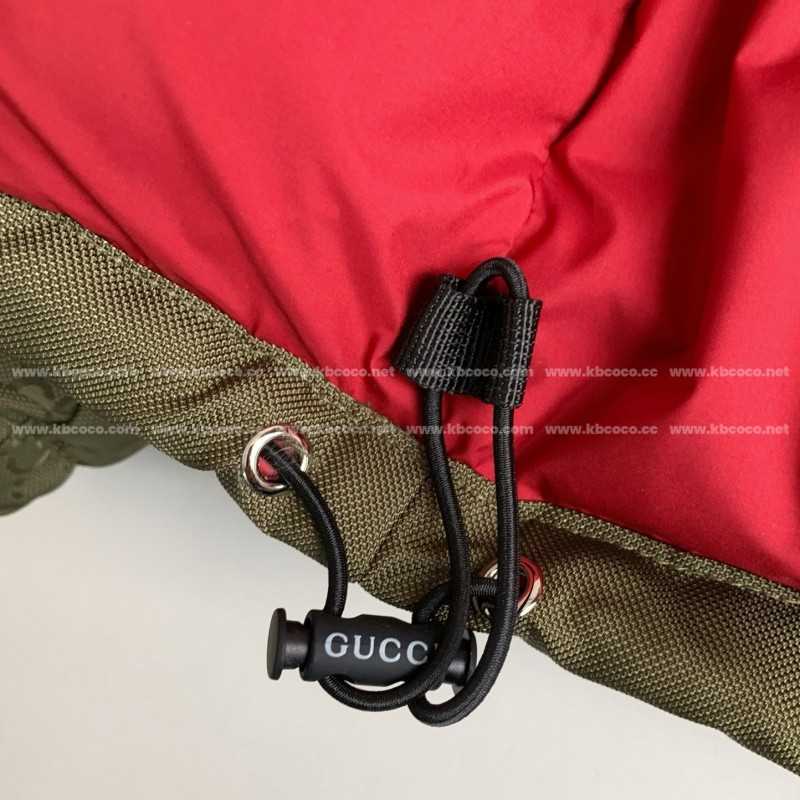 G*u*i Hooded patterned down jacket