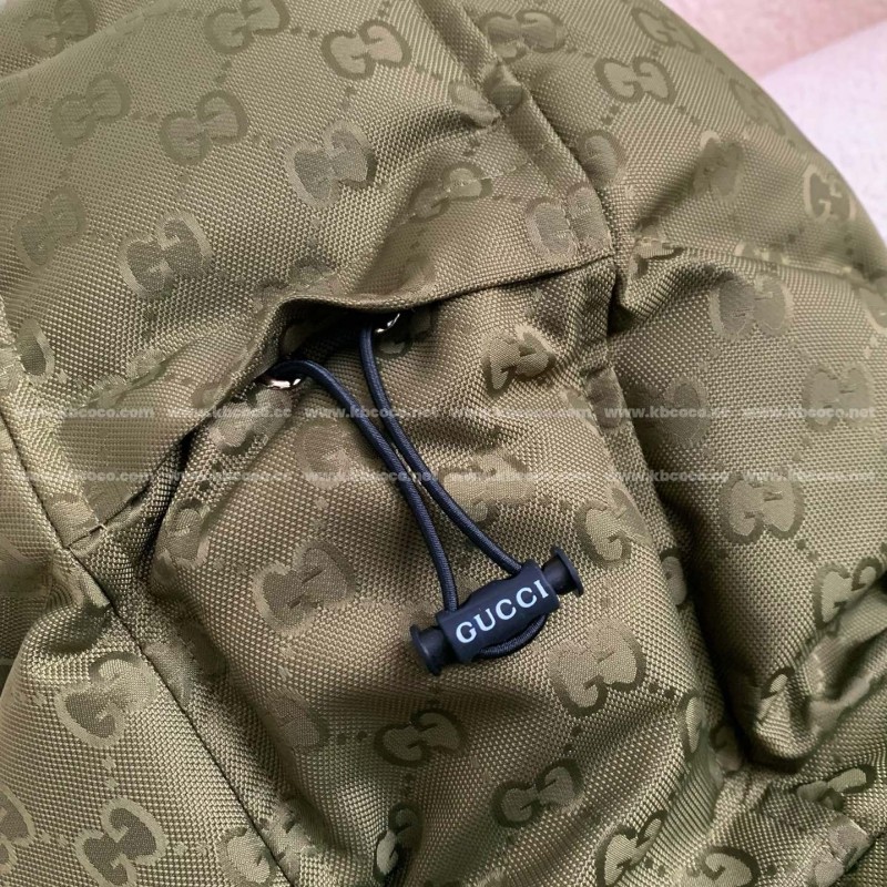 G*u*i Hooded patterned down jacket