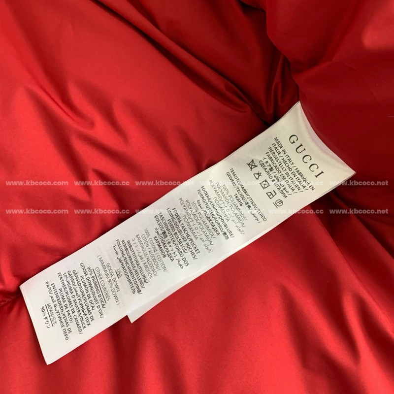 G*u*i Hooded patterned down jacket