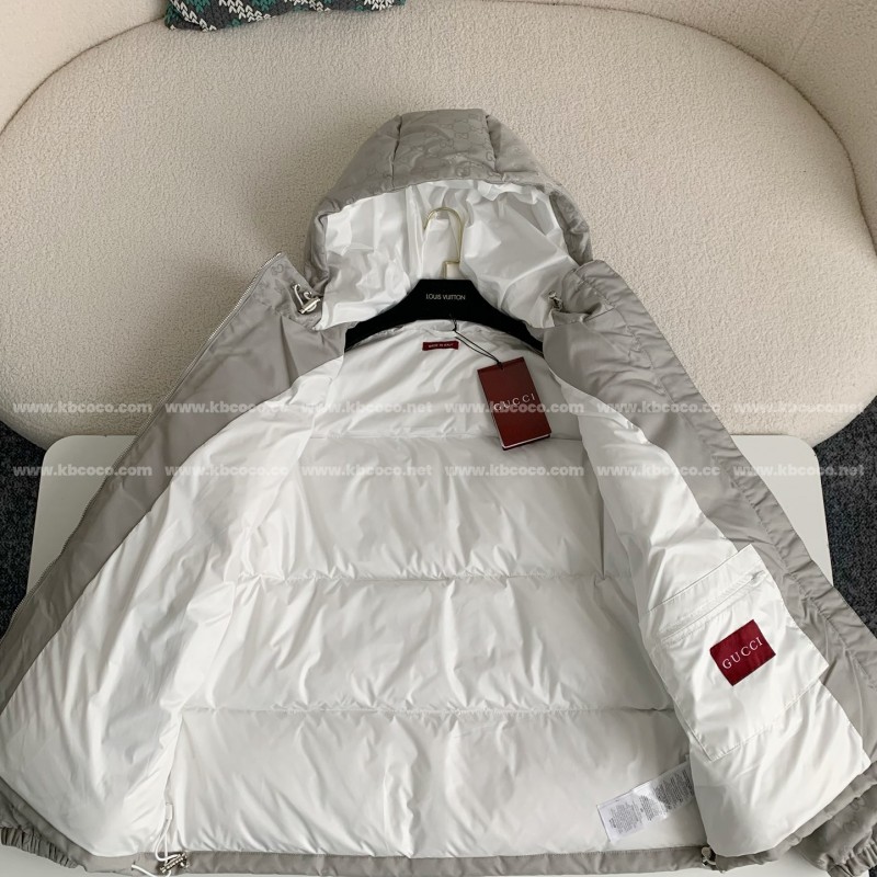 G*u*i Hooded patterned down jacket