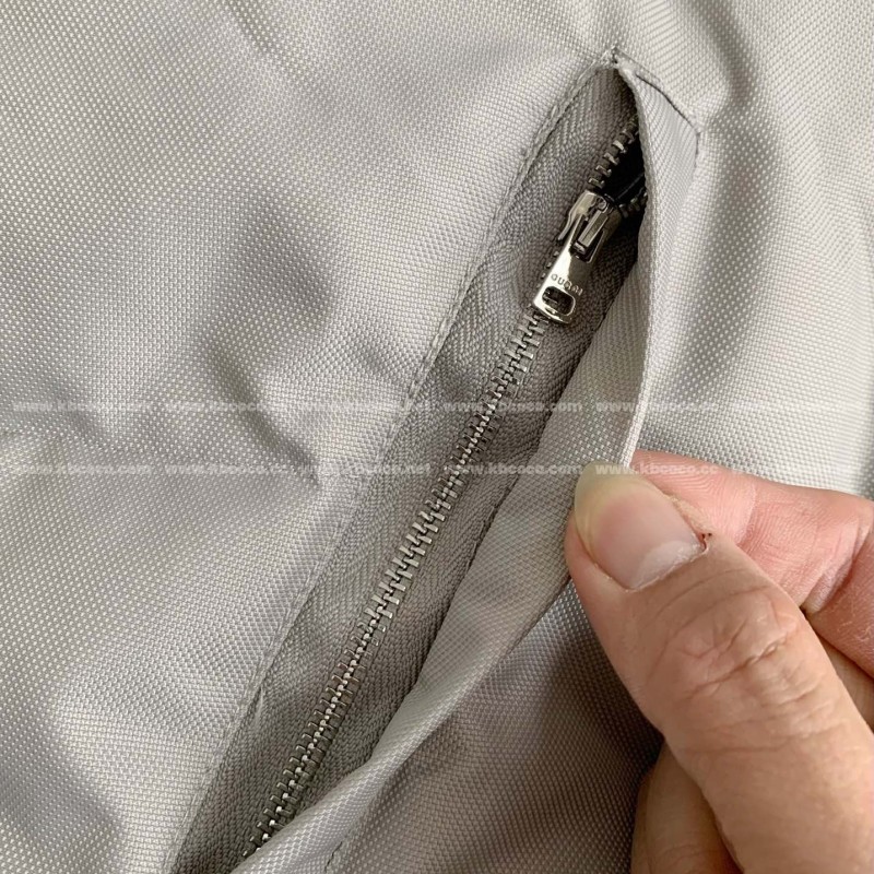 G*u*i Hooded patterned down jacket