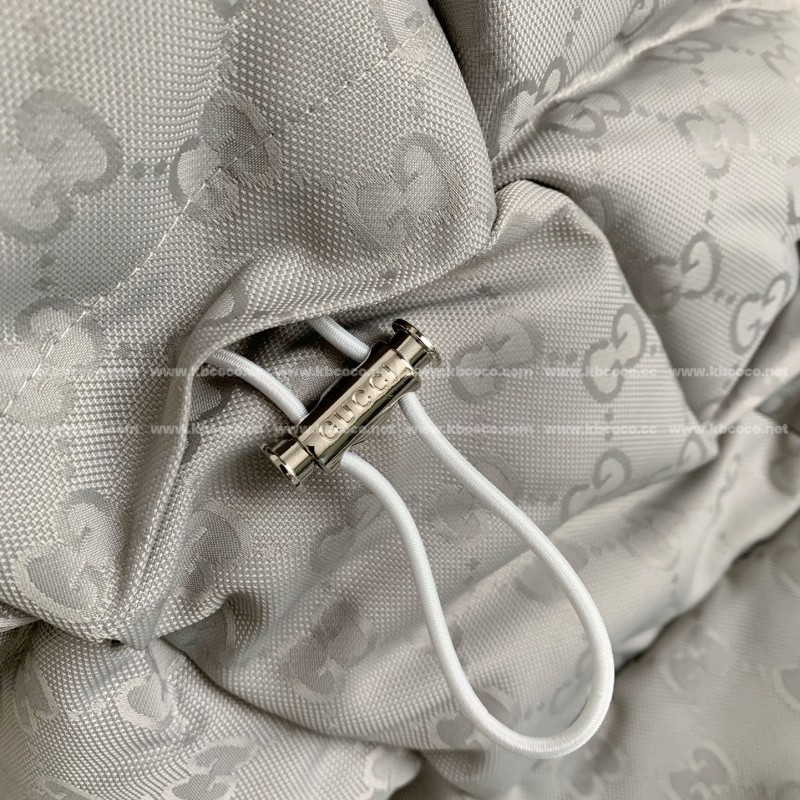 G*u*i Hooded patterned down jacket