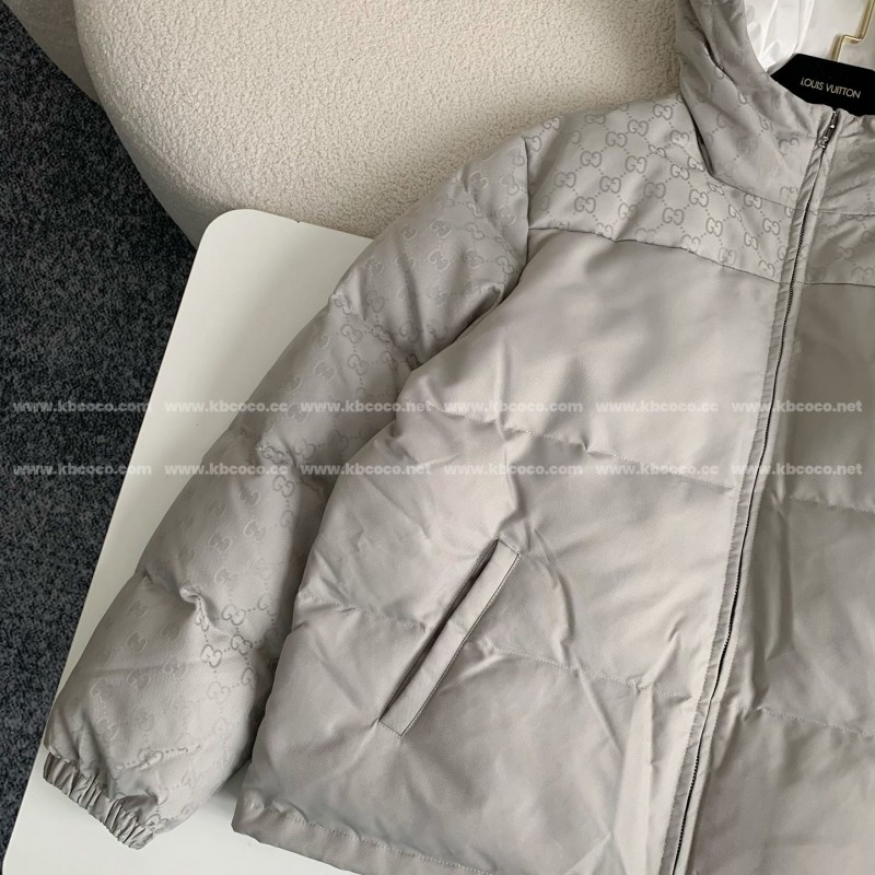 G*u*i Hooded patterned down jacket