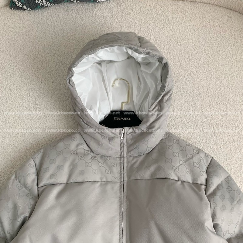 G*u*i Hooded patterned down jacket