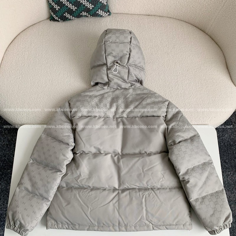 G*u*i Hooded patterned down jacket