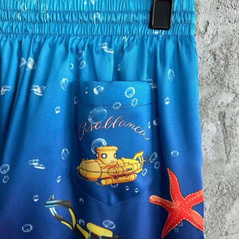 CASABLANCA Blue silk shorts with marine animal print