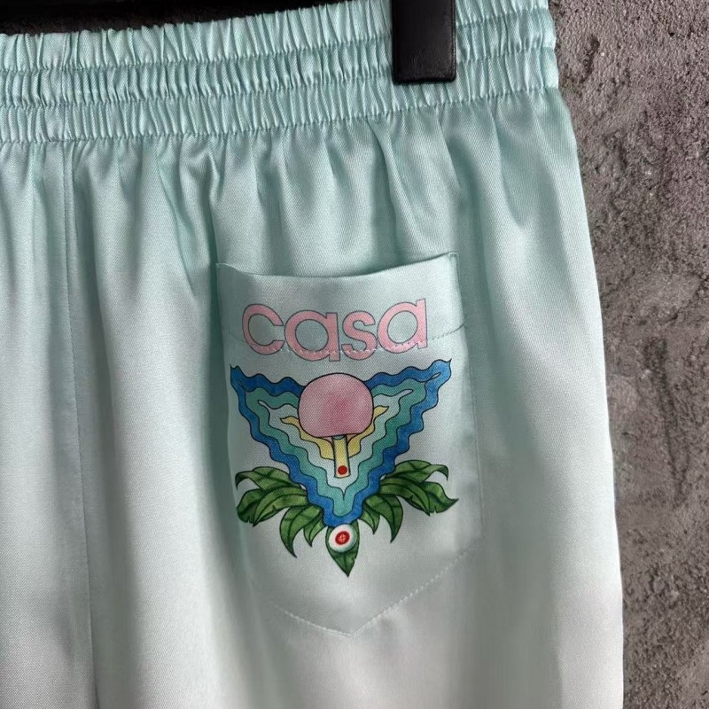 CASABLANCA Light blue silk shorts with ripple pattern