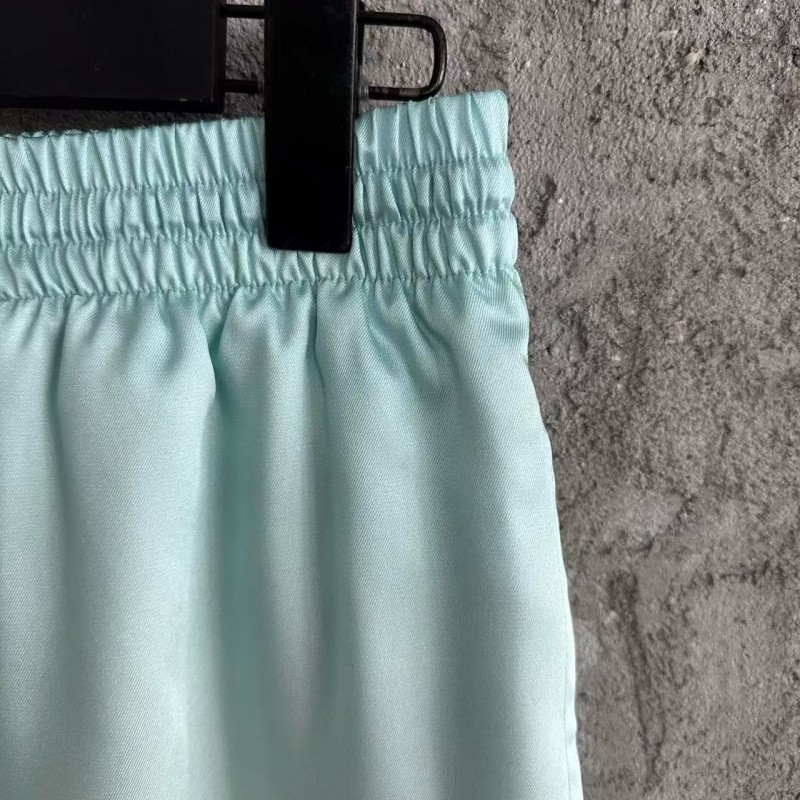 CASABLANCA Light blue silk shorts with ripple pattern