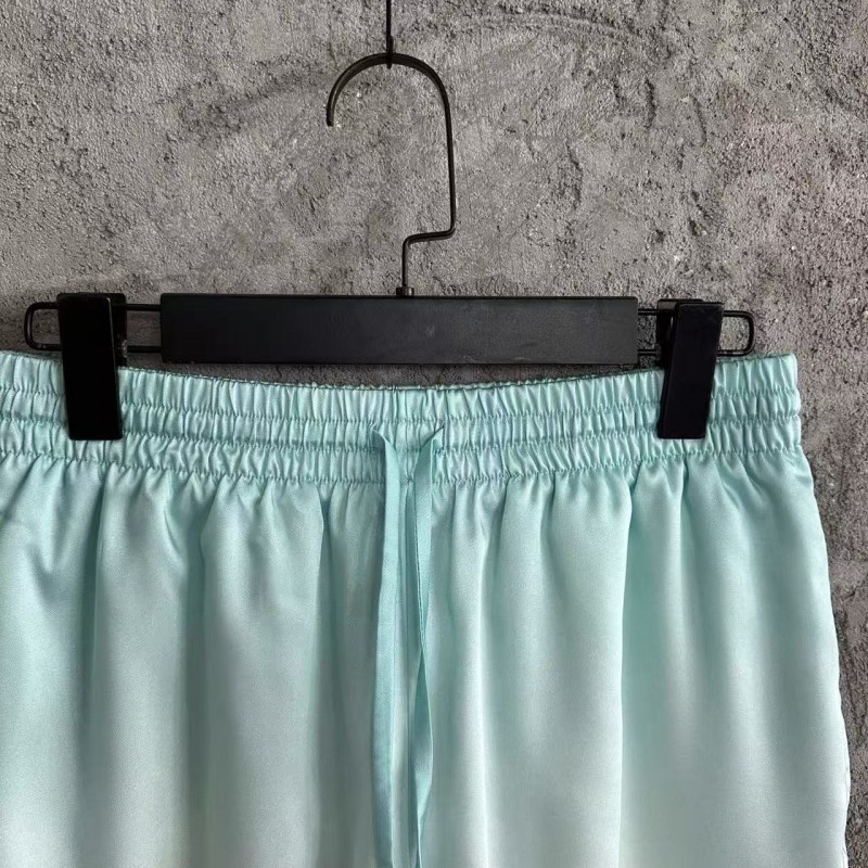 CASABLANCA Light blue silk shorts with ripple pattern