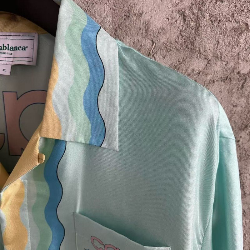 CASABLANCA Light blue silk T-shirt with ripple pattern