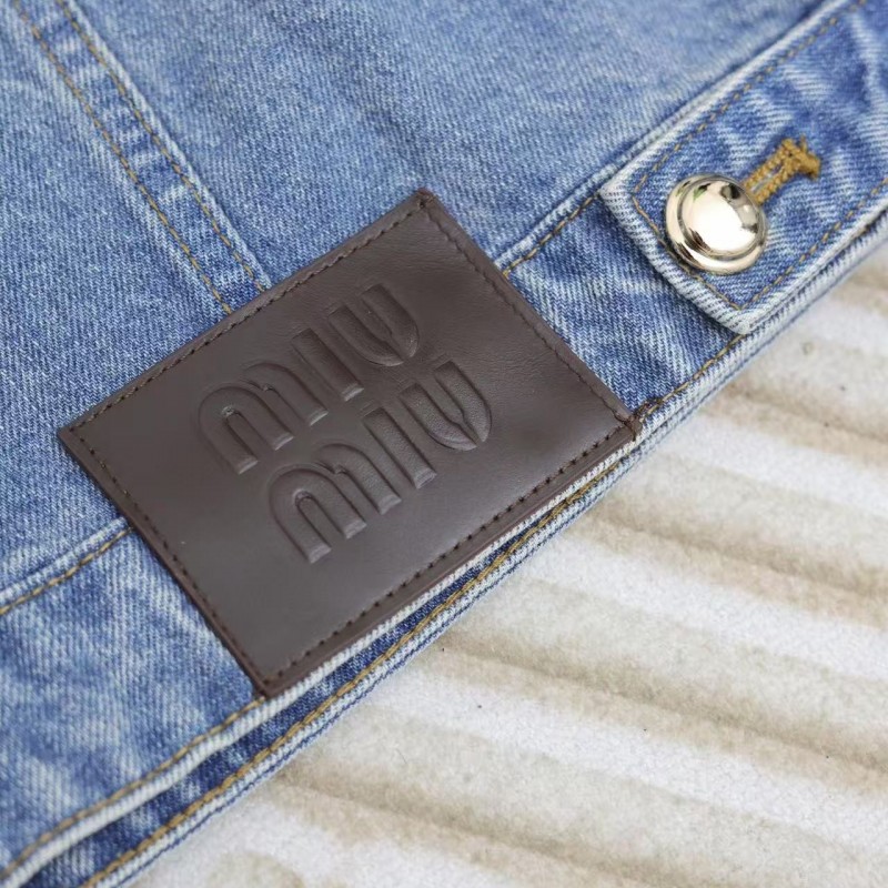 M*um*u washed denim jacket