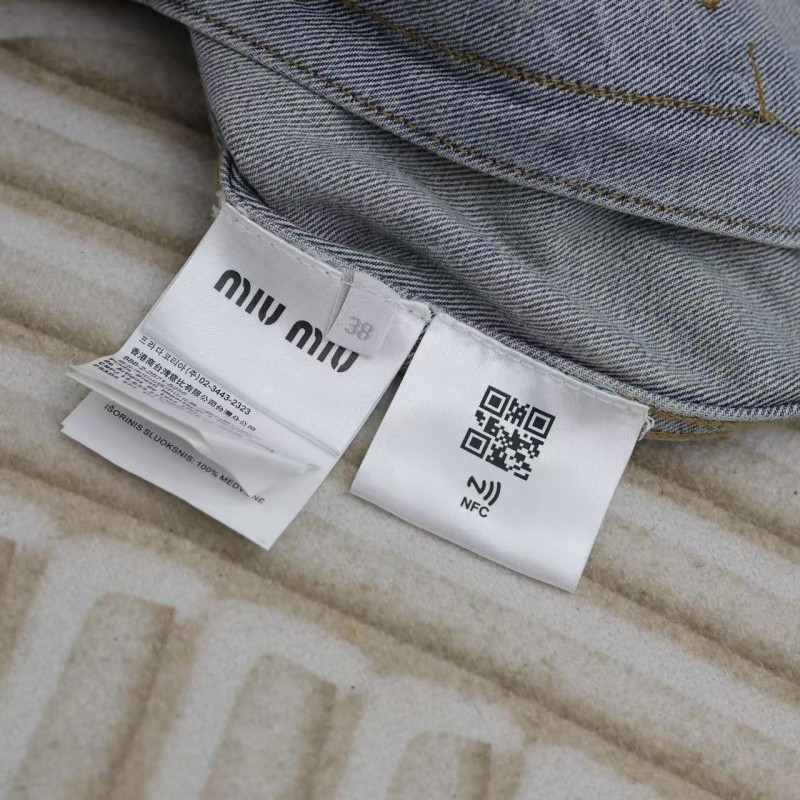 M*um*u washed denim jacket