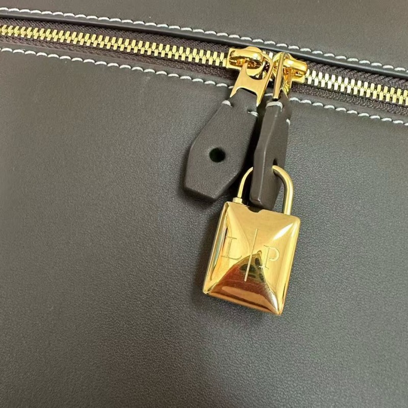 L**o p*ana new style black imported cowhide messenger bag size: 27*16*10cm