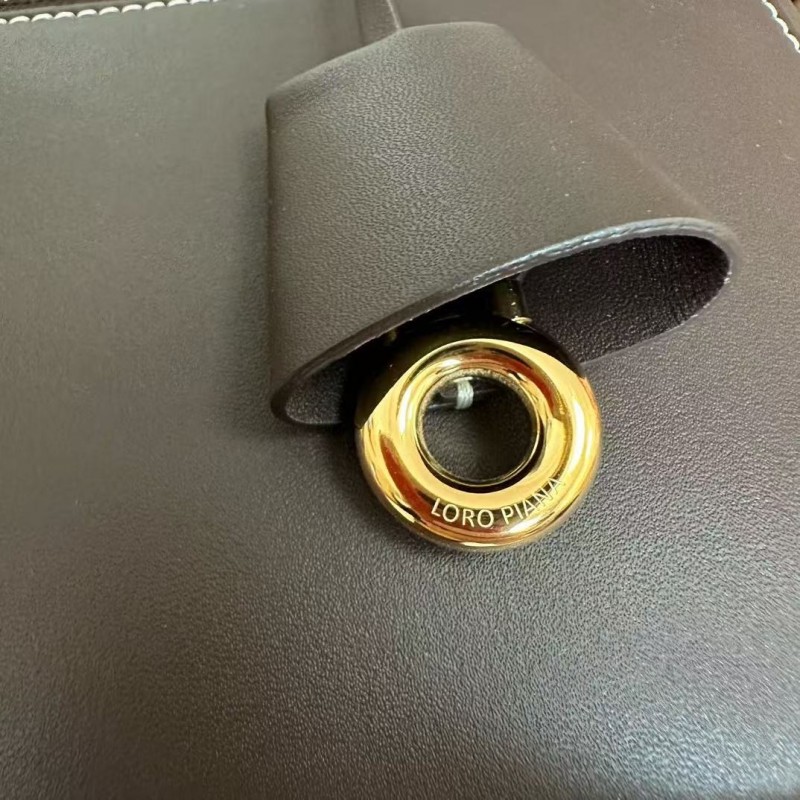 L**o p*ana new style black imported cowhide messenger bag size: 27*16*10cm