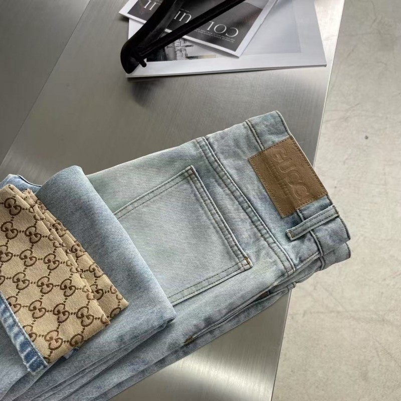 G*u*i cuffed washed jeans