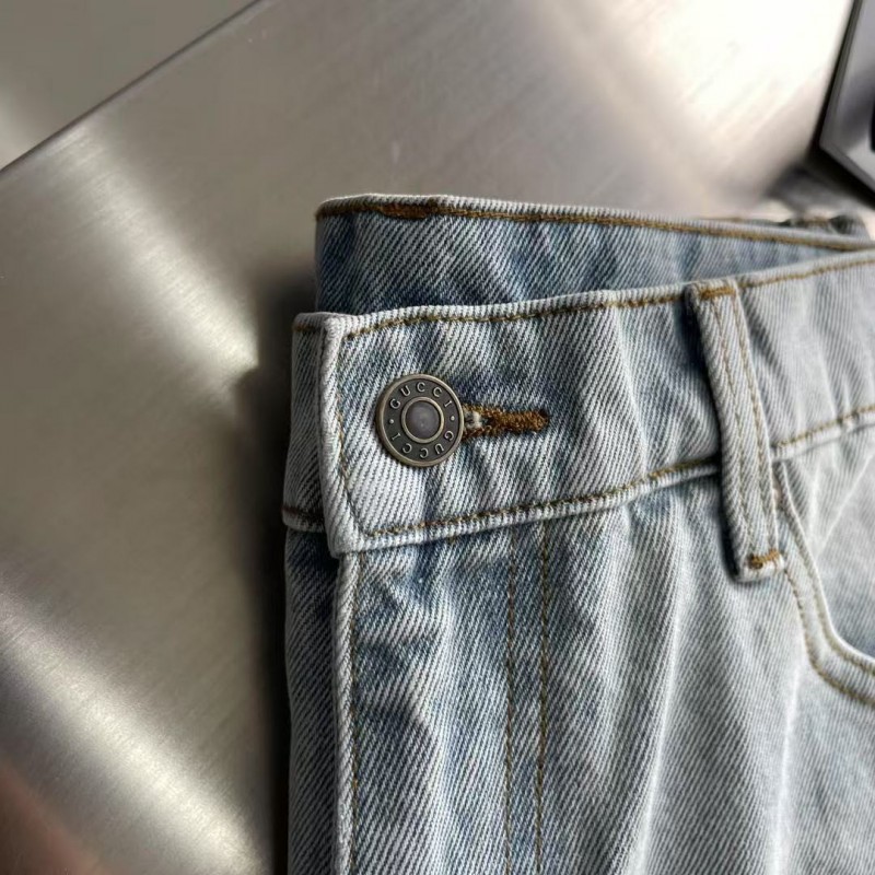 G*u*i cuffed washed jeans