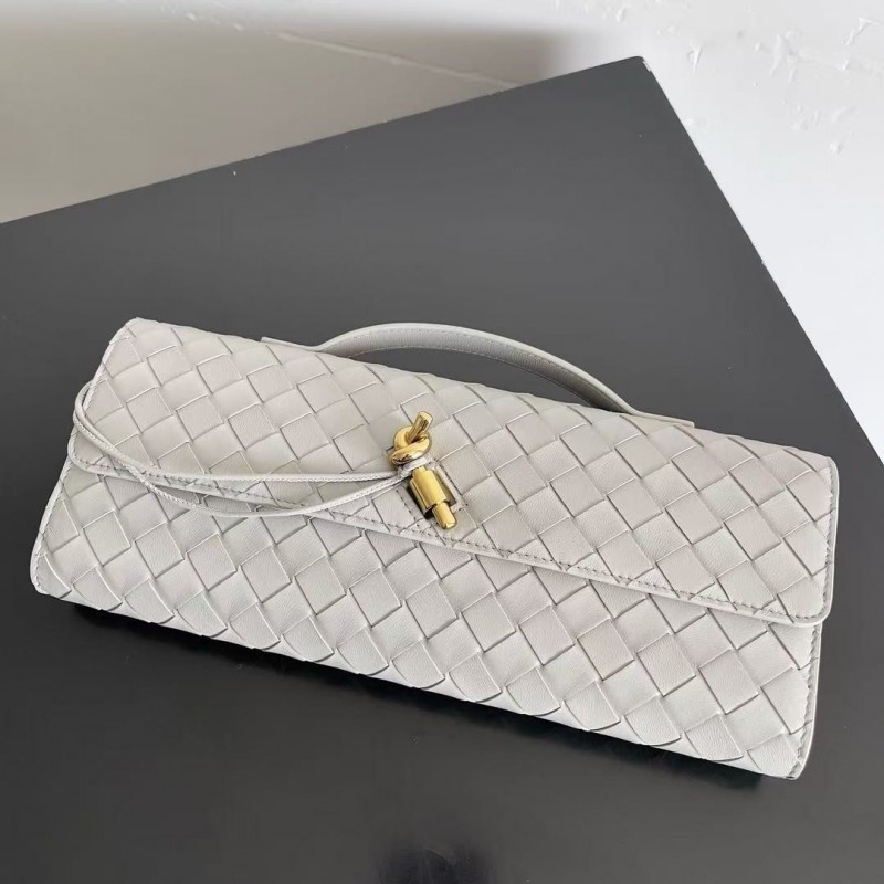 BOTTECA Ve*ne*ta uses exquisite craftsmanship intreccio woven imported sheepskin evening clutch bag Si