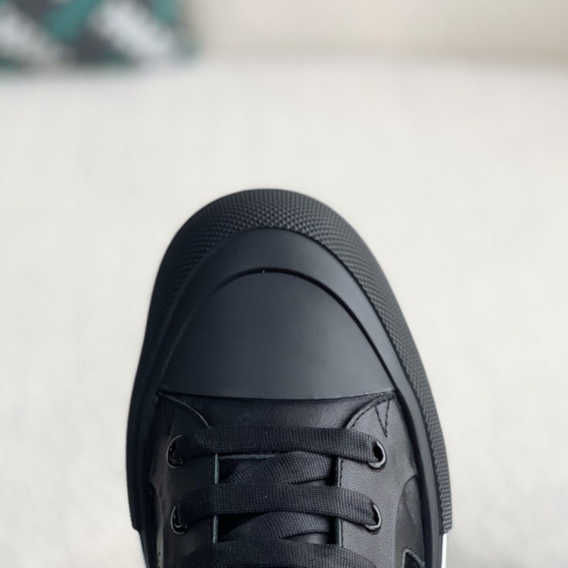 Ale*d*r M*Q*en Sneakers