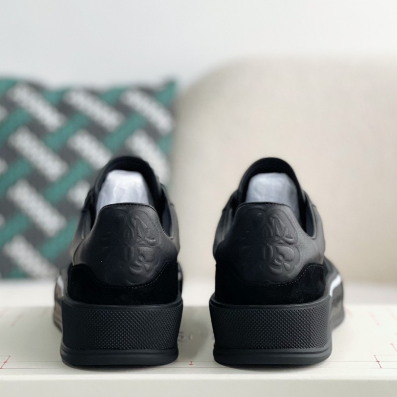 Ale*d*r M*Q*en Sneakers