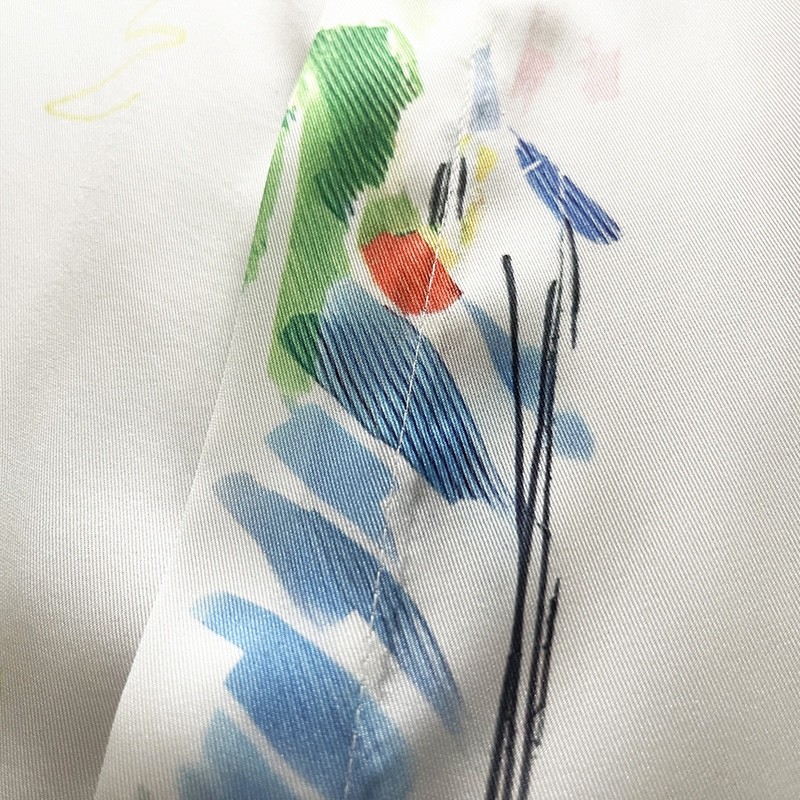 Casablanca Dotted orange silk blouse with loose, thin sleeves